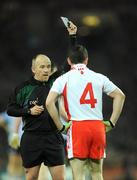 31 January 2009; Referee Martin Duffy shows the black book to Tyrone's Michael McGee. Allianz National Football League, Division 1, Round 1, Dublin v Tyrone, Croke Park, Dublin. Picture credit: Ray McManus / SPORTSFILE