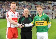 26 April 2009; Captains Fergal Doherty, Derry, and Darran O'Sullivan, Kerry, shake hands in front of referee Martin Duffy. Allianz GAA National Football League, Division 1 Final, Kerry v Derry, Croke Park, Dublin. Picture credit: Ray McManus / SPORTSFILE
