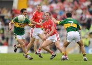 7 June 2009; Patrick Kelly, Cork, in action against Paul Galvin, left, and Ger Spillane, Kerry. Munster GAA Football Senior Championship Semi-Final, Kerry v Cork, Fitzgerald Stadium, Killarney, Co. Kerry. Picture credit: Stephen McCarthy / SPORTSFILE
