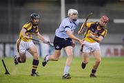 10 June 2009; Peter Kelly, Dublin, in action against Colm Kennelly, left, and Paul Morris, Wexford. Bord Gais Energy Leinster U21 Hurling Championship Semi-Final, Dublin v Wexford, Parnell Park, Dublin. Picture credit: Stephen McCarthy / SPORTSFILE