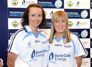 9 June 2009; The Bord Gais Energy Teams of the 2009 Leagues have been announced. Thie new joint initiative from the Ladies Gaelic Football Associaton and Bord Gais Energy recognises the players who excelled during the league campaigns across all the divisions. 45 players from 22 counties were selected and were presented with a specially commissioned kit to mark their achievenents. Pictured are Monaghan players Niamh Kindlon, left, and Ciara McAnespie, who received their awards from Pat Quill, President, Cumann Peil Gael na mBan and Ger Cunningham, Bord Gais Energy. Croke Park, Dublin. Picture credit: Brendan Moran / SPORTSFILE                                                                                                                                                                   *** Local Caption ***