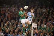 18 October 2015; Rob Kearney, Ireland, and Santiago Cordero, Argentina, contest a high ball. 2015 Rugby World Cup Quarter-Final, Ireland v Argentina. Millennium Stadium, Cardiff, Wales. Picture credit: Brendan Moran / SPORTSFILE