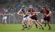 18 October 2015; David O'Brien, Tallow, in action against Tim O'Sullivan and Shane O'Sullivan, Ballygunnar. J.J. Kavanagh & Sons Ltd. Waterford County Senior Hurling Championship Final, Ballygunnar v Tallow. O'Connor Park, Walsh Park, Waterford. Picture credit: Ray McManus / Sportsfile
