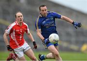 18 October 2015; Johnny Dunning, Clann na nGael, in action against Enda Barrett, Pádraig Pearses. Roscommon County Senior Football Championship Final, Pádraig Pearses v Clann na nGael. Dr. Hyde Park, Roscommon. Picture credit: David Maher / SPORTSFILE
