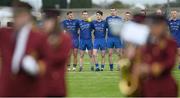 18 October 2015; Members of the Clann na nGael team stand together during the playing of the National Anthem. Roscommon County Senior Football Championship Final, Pádraig Pearses v Clann na nGael. Dr. Hyde Park, Roscommon. Picture credit: David Maher / SPORTSFILE
