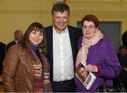 20 October 2015; Geraldine and Anita Clancy, from Brickens, Co. Mayo, with former Galway and Mayo football manager John O'Mahony, T.D at the launch of his autobiography 'O'Mahony - Keeping the Faith'. St Nathy's College, Chapel Street, Ballaghadereen, Co. Roscommon. Photo by Sportsfile