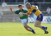 7 June 2009; David Russell, Clare, in action against Eoin Hogan, Limerick. Munster GAA Football Senior Championship Semi-Final, Clare v Limerick, Cusack Park, Ennis, Co. Clare. Picture credit: Matt Browne / SPORTSFILE