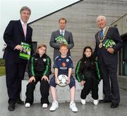 12 May 2009; Minister for Children and Youth Affairs Barry Andrews, T.D., John Delaney, Chief Executive of the Football Association of Ireland, left, President of the Football Association of Ireland David Blood, right, with young soccer players Kaitlin Harrop, age 11, left, Megan Issolah, age 11, both from Mountview Boys and Girls Football Club, Clonsilla, Dublin, and Gary Creevey, age 11, from Palmerstown Rangers Football Club, at the launch of the FAI Code of Ethics and Good Practice for Children's Football. FAI Headquarters, Abbotstown, Dublin. Picture credit: Stephen McCarthy / SPORTSFILE *** Local Caption ***