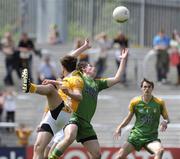 14 June 2009; Peter Devine, Donegal, in action against Hugh McAnulty, Antrim. Ulster Minor Football Championship, Donegal v Antrim, MacCumhaill Park, Ballybofey, Co. Donegal. Picture credit: Oliver McVeigh / SPORTSFILE