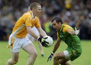 14 June 2009; Paddy Cunningham, Antrim, in action against Karl Lacey, Donegal. GAA Football Ulster Senior Championship Quarter-Final, Donegal v Antrim, MacCumhaill Park, Ballybofey, Co. Donegal. Picture credit: Oliver McVeigh / SPORTSFILE