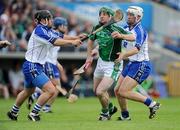 14 June 2009; Andrew O'Shaughnessy, Limerick, in action against Noel Connors, left, and Richie Foley, Waterford. GAA Hurling Munster Senior Championship Semi-Final, Limerick v Waterford, Semple Stadium, Thurles, Co. Tipperary. Picture credit: Brendan Moran / SPORTSFILE
