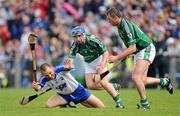 14 June 2009; Damien Reale, left, and Brian Geary, Limerick, in action against Ken McGrath, Waterford. GAA Hurling Munster Senior Championship Semi-Final, Limerick v Waterford, Semple Stadium, Thurles, Co. Tipperary. Picture credit: Stephen McCarthy / SPORTSFILE