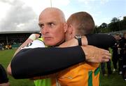 14 June 2009; Antrim manager Liam Bradley and captain Paddy Cunningham embrace after the final whistle. GAA Football Ulster Senior Championship Quarter-Final, Donegal v Antrim, MacCumhaill Park, Ballybofey, Co. Donegal. Picture credit: Oliver McVeigh / SPORTSFILE *** Local Caption ***