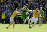 14 June 2009; Christy Toye, Donegal, in action against Tomas McCann and Aodhan Gallagher, Antrim. GAA Football Ulster Senior Championship Quarter-Final, Donegal v Antrim, MacCumhaill Park, Ballybofey, Co. Donegal. Picture credit: Oliver McVeigh / SPORTSFILE