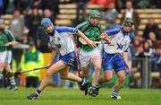 14 June 2009; Andrew O'Shaughnessy, Limerick, in action against Michael Walsh, left, and Noel Connors, Waterford. GAA Hurling Munster Senior Championship Semi-Final, Limerick v Waterford, Semple Stadium, Thurles, Co. Tipperary. Picture credit: Stephen McCarthy / SPORTSFILE