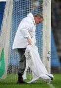 14 June 2009; An umpire puts on his waterproof trousers before the game. GAA Hurling Munster Senior Championship Semi-Final, Limerick v Waterford, Semple Stadium, Thurles, Co. Tipperary. Picture credit: Brendan Moran / SPORTSFILE
