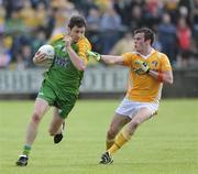 14 June 2009; Christy Toye, Donegal, in action against James Loughrey, Antrim. GAA Football Ulster Senior Championship Quarter-Final, Donegal v Antrim, MacCumhaill Park, Ballybofey, Co. Donegal. Picture credit: Oliver McVeigh / SPORTSFILE *** Local Caption ***