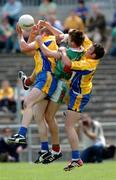 19 June 2005; Seamus O'Neill, left and Brian Higgins, Roscommon, in action against Ronan McGarrity, Mayo. Bank of Ireland Connacht Senior Football Championship Semi-Final, Mayo v Roscommon, Dr. Hyde Park, Roscommon. Picture credit; David Maher / SPORTSFILE