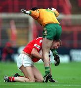 5 April 1998; Alan O'Regan of Cork in action against Damian Diver of Donegal during the National Football League Quarter-Final match between Cork and Donegal at Croke Park in Dublin. Photo by Ray McManus/Sportsfile