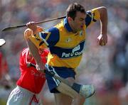 3 May 1998; Anthony Daly of Clare in action against Joe Deane of Cork during the National Hurling League Semi-Final match between Cork and Clare at Semple Stadium in Thurles, Tipperary. Photo by Ray McManus/Sportsfile
