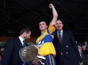 19 July 1998; Clare Captain Anthony Daly salutes the Clare Fans after becoming Munster hurling Champions in the Munster GAA Hurling Senior Championship Final Replay match between Clare and Waterford at Semple Stadium in Thurles, Tipperary. Photo by Ray McManus/Sportsfile