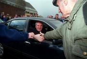 12 April 1998; An Taoiseach Bertie Ahern, T.D. is congratulated, for his efforts in the Peace Talks, by supporters as he drives himself and his two daughters away from Croke Park following the Church & General National Football League Semi-Final match between Donegal and Offaly at Croke Park in Dublin. Photo by Ray McManus/Sportsfile