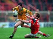 5 April 1998; Brendan Devenney of Donegal in action against Nicholas Murphy of Cork during the National Football League Quarter-Final match between Cork and Donegal at Croke Park in Dublin. Photo by Ray McManus/Sportsfile