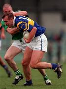 10 May 1998; Brian Burke of Tipperary in action against Martin Dineen of Limerick during the Munster GAA Football Senior Championship First Round match between Limerick and Tipperary at Gaelic Grounds in Limerick. Photo by Ray McManus/Sportsfile