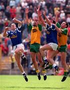22 June 1997; Brian Murray of Cavan, right, supported by team-mate Jim McGuinness, in action against Patrick Shiels, centre and Stephen King of Cavan during the Ulster GAA Football Senior Championship Semi-Final match between Cavan and Donegal at St Tiernach's Park in Clones, Monaghan. Photo by David Maher/Sportsfile