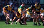 9 Aug 1998. Action features, from left, Richard Woods, Clare,  Brian Quinn, Clare, John Troy, Offaly, Johnny Dooley, Offaly and Sean McMahon, Clare. All-Ireland Hurling semi-final, Clare v Offaly, Croke Park. Picture Credit: Brendan Moran/SPORTSFILE.
