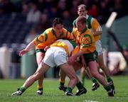 12 April 1998; Barry Malone of Offaly is blocked by Brednan Devenney, left, and Brian Roper of Donegal during the Church & General National Football League Semi-Final match between Donegal and Offaly at Croke Park in Dublin. Photo by Ray McManus/Sportsfile