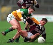 5 April 1998; Niall Finnegan of Galway in action against Cathal Daly of Offaly during the National Football League Quarter-Final match between Galway and Offaly at Dr. Hyde Park in Roscommon. Photo by Matt Browne/Sportsfile