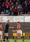12 April 1998; DJ Carey of Kilkenny gives his substitute slip to referee Pat Aherne during the National Hurling League match between Kilkenny and Laois at Nowlan Park in Kilkenny. Photo by Matt Browne/Sportsfile