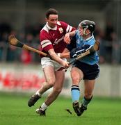 National Hurling League Division 1A, Dublin v Galway, Parnell Park. 8/3/98. Galway's Liam Burke, left, in a tussle for possession with Dublin's David Sweeney. Photograph © Brendan Moran SPORTSFILE.