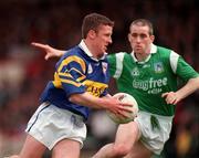 10 May 1998; Declan Browne of Tipperary in action against Diarmuid Sheedy of Limerick during the Munster GAA Football Senior Championship First Round match between Limerick and Tipperary at Gaelic Grounds in Limerick. Photo by Ray McManus/Sportsfile