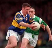 10 May 1998; Declan Browne of Tipperary in action against Diarmuid Sheedy of Limerick during the Munster GAA Football Senior Championship First Round match between Limerick and Tipperary at Gaelic Grounds in Limerick. Photo by Ray McManus/Sportsfile