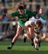 Erin Isle's Eddie Barr in action against Clane's Willie McCreery, in the Leinster club championship final  at Navan yesterday.Photograph David Maher, Sportsfile.