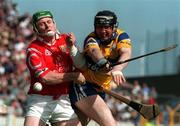 3 May 1998; Conor Clancy of Clare in action against Fergal Ryan of Cork during the National Hurling League Semi-Final match between Cork and Clare at Semple Stadium in Thurles, Tipperary. Photo by Brendan Moran/Sportsfile