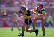 9 August 1998; Ger O'Loughlin of Clare in action against Kevin Kinahan of Offaly during the GAA Hurling All-Ireland Senior Championship Semi-Final match between Offaly and Clare at Croke Park in Dublin. Photo by Ray McManus/Sportsfile