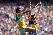 9 August 1998; Kevin Kinahan of Offaly in action against Ger O'Loughlin of Clare during the GAA Hurling All-Ireland Senior Championship Semi-Final match between Offaly and Clare at Croke Park in Dublin. Photo by Damien Eagers/Sportsfile