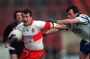 12 April 1998; Joe Brolly of Derry in action against Noel Marron of Monaghan during the National Football League Semi-Final match between Derry and Monaghan at Croke Park in Dublin. Photo by Ray McManus/Sportsfile