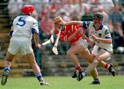17 May 1998; Joe Deane of Cork in action against Tom Feeney, right, Stephen Frampton of Waterford during the National Hurling League Final match between Cork and Waterford at Semple Stadium in Thurles, Co Tipperary. Photo by Ray McManus/Sportsfile