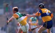 9 August 1998; Joe Dooley of Offaly in action against Michael O'Halloran of Clare during the GAA Hurling All-Ireland Senior Championship Semi-Final match between Offaly and Clare at Croke Park in Dublin. Photo by Ray McManus/Sportsfile