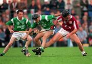 5 October 1997; Joe Rabitte of Galway in action against Mike Nash of Limerick, centre, supported by team-mate Declan Nash during the Church & General National Hurling League Final match between Limerick and Galway at Cusack Park in Ennis, Clare. Photo by Ray McManus/Sportsfile