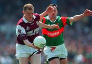 25 May 1998; John Donnellan of Galway in action against Michael Flanagan of Mayo during the Connacht GAA Football Senior Championship Quarter-Final match between Galway and Mayo at Tuam Stadium in Tuam, Galway. Photo by Ray McManus/Sportsfile