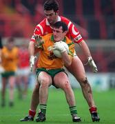 5 April 1998; John Joe Doherty of Donegal in action against Pat Hegarty of Cork during the National Football League Quarter-Final match between Cork and Donegal at Croke Park in Dublin. Photo by Ray McManus/Sportsfile
