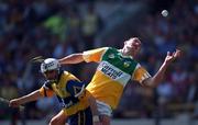 9 August 1998; Kevin Kinahan of Offaly in action against Ger O'Loughlin of Clare during the GAA Hurling All-Ireland Senior Championship Semi-Final match between Offaly and Clare at Croke Park in Dublin. Photo by Ray McManus/Sportsfile