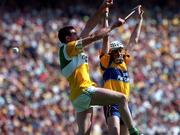9 August 1998, Kevin Kinahan of Offaly in action against Ger Loughlin of Clare during the GAA Hurling All-Ireland Senior Championship Semi-Final match between Offaly and Clare at Croke Park in Dublin. Photo by David Maher/SPORTSFILE
