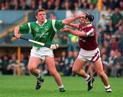 5 October 1997; Mark Foley of Limerick in action against Michael Donoghue of Galway during the National Hurling League Final match between Limerick and Galway at Cusack Park in Ennis, Clare. Photo by Ray McManus/Sportsfile