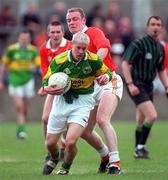 2 May 1998; Martin Beckett of Kerry in action against Philip Oldham of Armagh during the GAA All-Ireland U-21 Football Semi-Final match between Kerry and Armagh at Parnell Park in Dublin. Photo by Brendan Moran/Sportsfile
